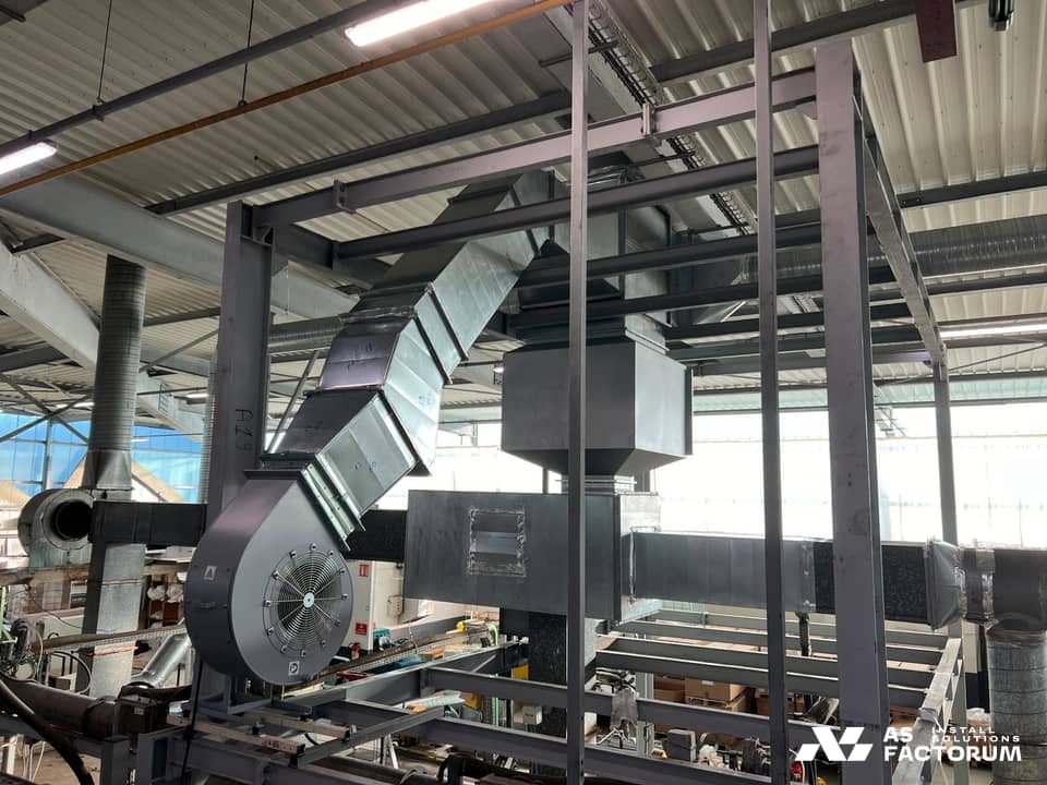 Grey painted steel frame supporting a centrifugal fan and galvanised rectangular ducts